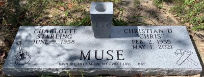 double flat gray granite headstone with a flower vase